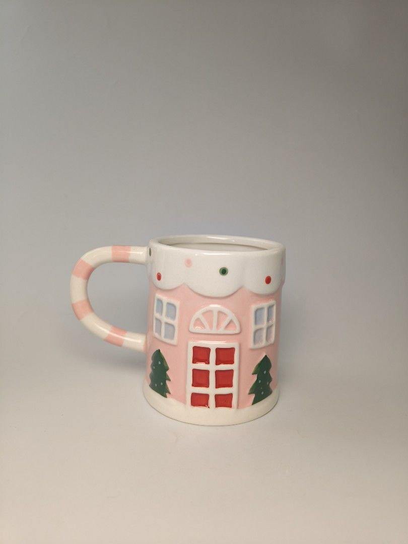 Pink gingerbread house mug (Category: Coffee & Tea Tableware) located in Cavite. Submitted by phtmt (Listing ID 1470262893, Image 1). Description: These are factory pull-out items, so minor imperfections or flaws may be present. Please manage your expectations..