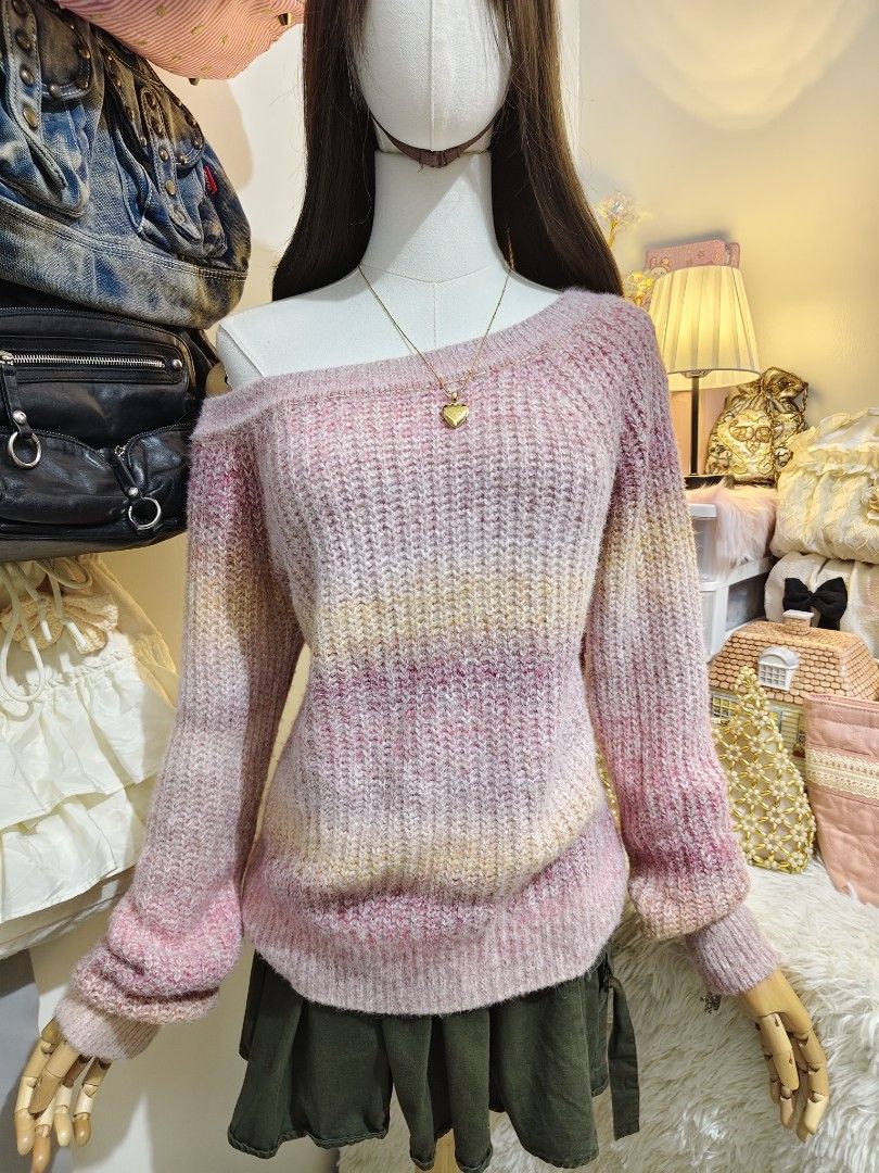 Pink gradient off-shoulder knit sweater (Category: Longsleeves) located in Manila. Submitted by chynii_28 (Listing ID 1470206194, Image 2). Description: - Style: Chunky knit sweater with an off-shoulder neckline - Colors: Soft ombre with pink, yellow, and pastel stripes - Fit: Relaxed fit with long sleeves - Details: Ribbed hem and cuffs - Material: Warm, soft, and cozy -kids size but fut Small-medium .
