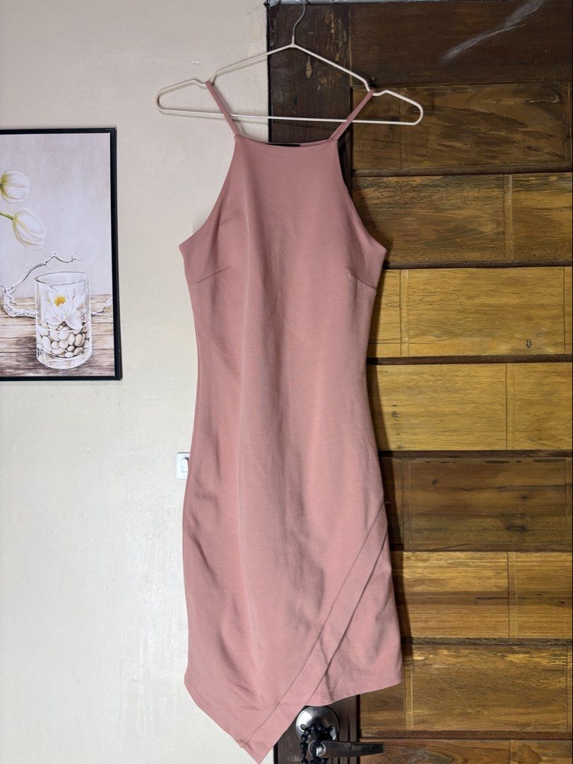 Pink Halter Neck Mini Dress (Category: Dresses) located in Angeles City. Submitted by muse_archive (Listing ID 1470149790, Image 2). Description: - Dusty pink -:lHalter neck, sleeveless bodycon dress with an asymmetrical wrap hem - Material: Soft ribbed fabric with thin shoulder straps - medium.