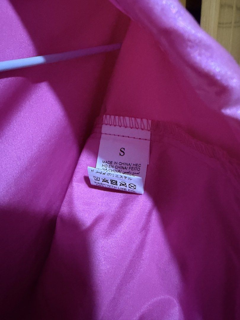 Pink Holographic Cargo Pants Size S (Category: Jeans) located in Manila. Submitted by yeyencollado (Listing ID 1470295662, Image 2). Description: - original price ₱778 - used once for halloween 2025, washed - Size: S (tag attached) - Color: Bright pink metallic with shiny iridescent finish - Fit: Drawstring waist and adjustable ankles - Details: Hanging side straps and multiple utility pockets - Style: Bold statement piece for parties and streetw