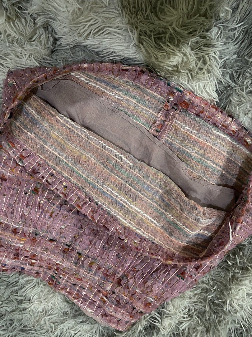 Pink textured tweed mini skirt with sequins (Category: Skirts) located in Manila. Submitted by zhahanna (Listing ID 1470227806, Image 3). Description: - Style: High-waisted mini skirt - waist: 24 in length: 10 in - Details: Pink textured fabric woven with multi-colored threads and tiny sequins - Closure: Hidden side zipper - Mode of Payment: GCash - Shipping: Via J&T Express (Buyer shoulders shipping fee) or same-day delivery via Lalamove/Grab (M