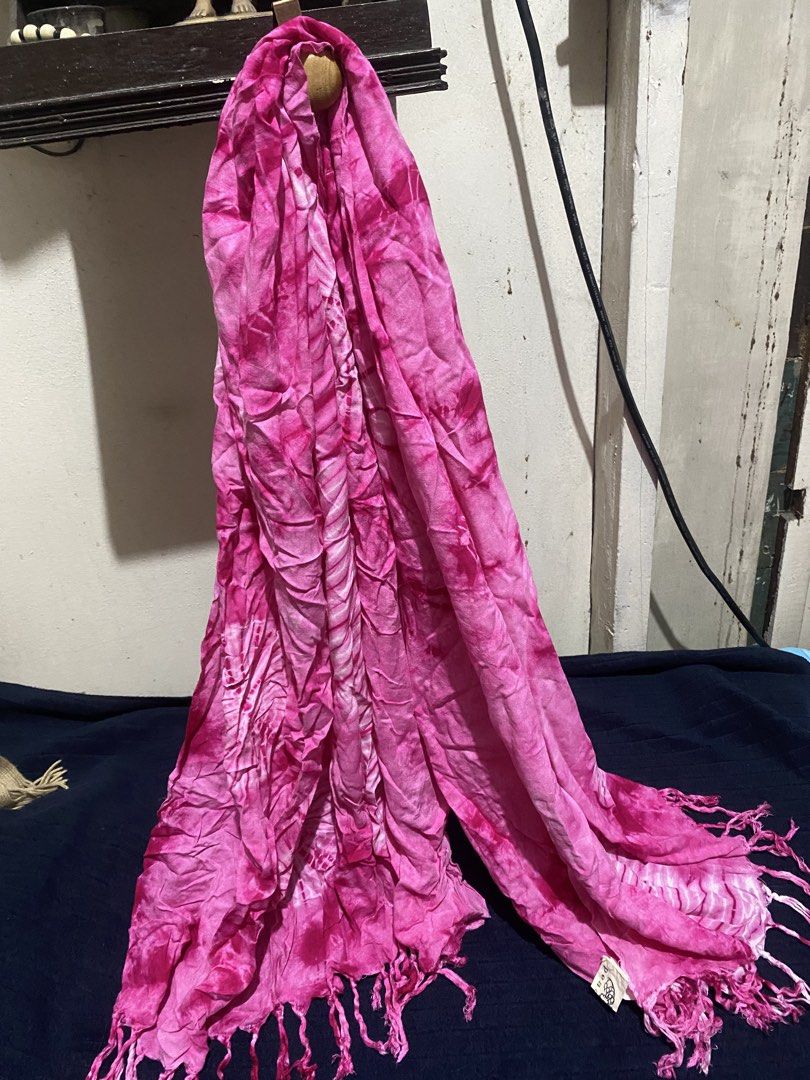Pink Tie-Dye Rayon Scarf with Fringe (Category: Scarves) located in Manila. Submitted by resi.diaz (Listing ID 1470324021, Image 1). Description: - Approx: 60 x 45 inches - Vibrant bright pink tie-dye design - Made from 100% lightweight rayon with a crinkled texture - Standard size featuring stylish fringe details at both ends - Imported from Thailand - Care instructions: Hand wash in cold water only.