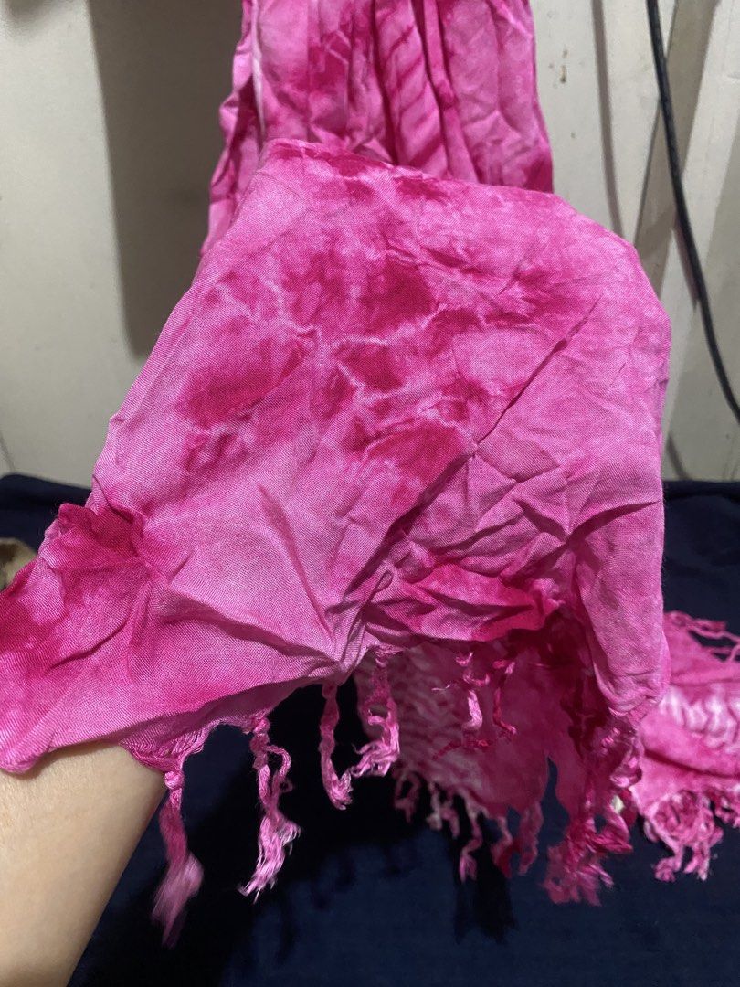 Pink Tie-Dye Rayon Scarf with Fringe (Category: Scarves) located in Manila. Submitted by resi.diaz (Listing ID 1470324021, Image 2). Description: - Approx: 60 x 45 inches - Vibrant bright pink tie-dye design - Made from 100% lightweight rayon with a crinkled texture - Standard size featuring stylish fringe details at both ends - Imported from Thailand - Care instructions: Hand wash in cold water only.