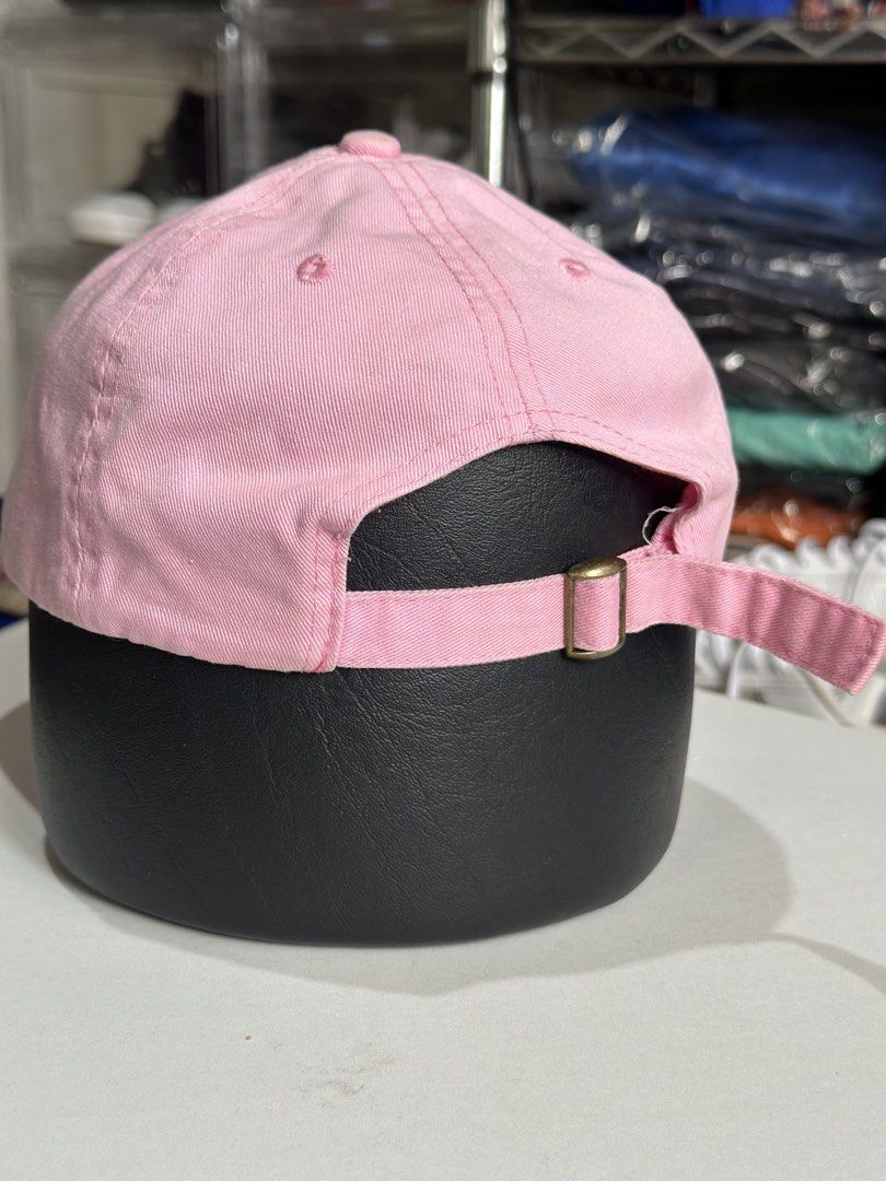 Pink USPS United States Postal Service Cap (Category: Caps & Hats) located in Daet. Submitted by thrifthings2018 (Listing ID 1470193781, Image 3). Description: - Brand: Cap America - Design: Pink baseball cap with embroidered USPS logo - Fit: Adjustable back strap with brass buckle hardware - Condition: Clean fabric throughout, ready to wear - Origin: Made in China.