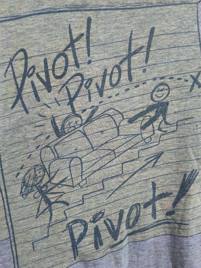 Pivot! Sketch from the friends (Category: Tshirts & Polo Shirts ) located in Taguig. Submitted by thriftedminds (Listing ID 1470310180, Image 3). Description: Item: Pivot! (Couch-moving sketch from the sitcom Friends)🔥 ‎Size: Large (Goodie two sleeves (NBC Universal Dated 2008) ‎Width: 21.5 ‎Length: 26.5 ‎Condition: Good ‎Issue: Pinhole, Bullet hole on sleeve, Color Bleeding DM to purchase 📩.