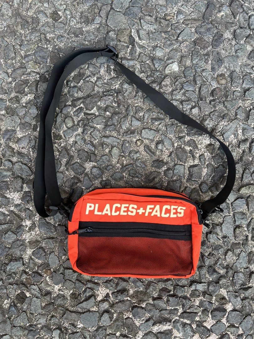Places + Faces Pouch bag (Category: Sling Bags) located in Quezon City. Submitted by shanks. (Listing ID 1470148096, Image 1). Description: Places + Faces Pouch Bag featuring a bold white brand logo across the top, a black mesh outer pocket with a zipper, and an adjustable black shoulder strap. Sign of wear in good condition Dimensions : Height : 7 inches Width : 12 inches .
