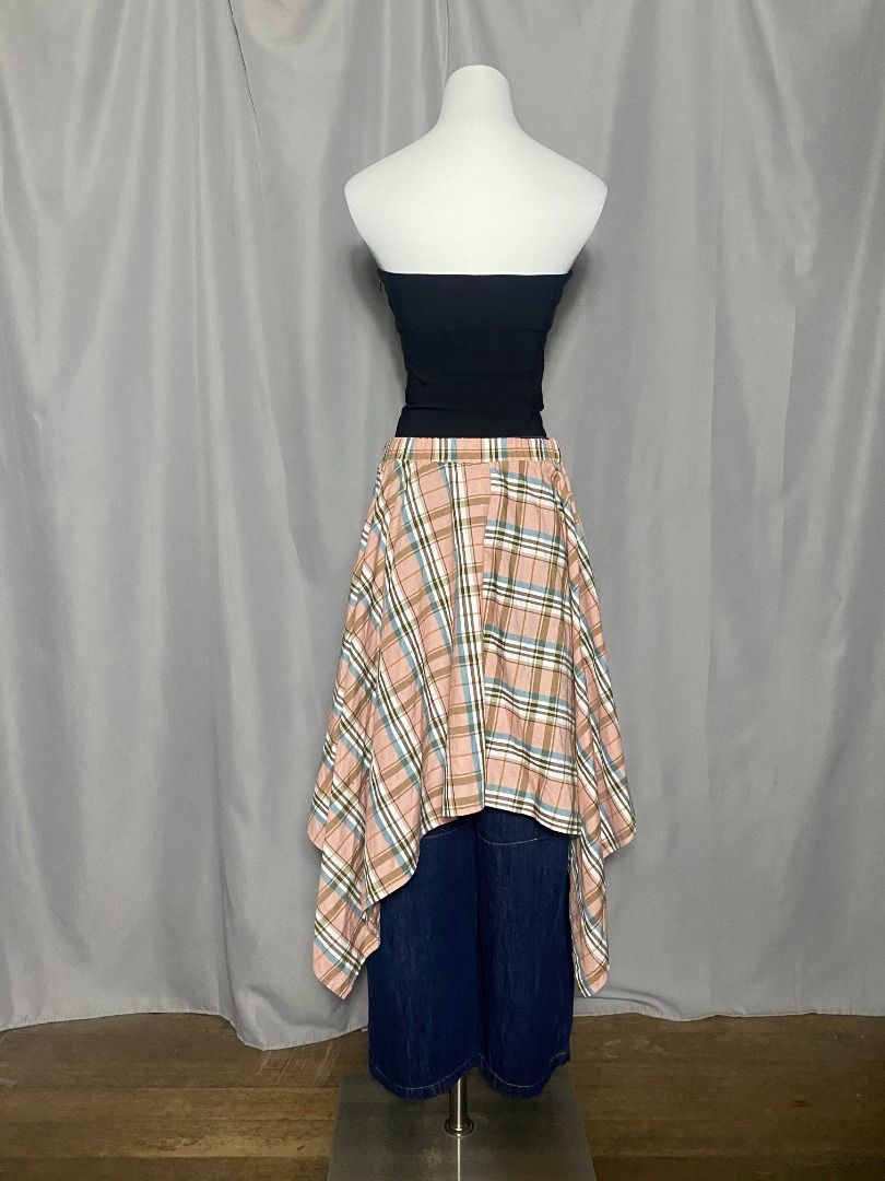 Plaid asymmetrical skirt (Category: Skirts) located in Las Pinas. Submitted by ipickyou (Listing ID 1470291259, Image 3). Description: Unwashed Condition: 10/10 𝗠𝗲𝗮𝘀𝘂𝗿𝗲𝗺𝗲𝗻𝘁𝘀 𝘄𝗵𝗲𝗻 𝗹𝗮𝗶𝗱 𝗳𝗹𝗮𝘁: -Waist: 91/2-18” .