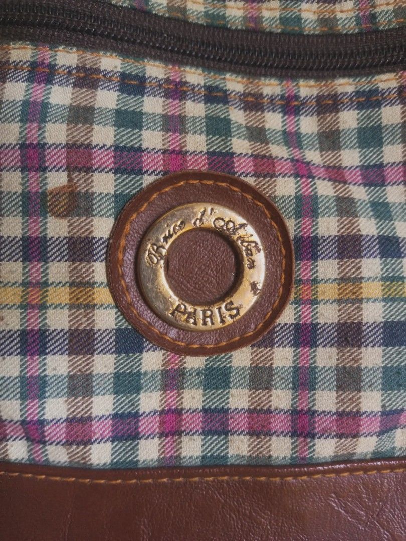 plaid bucket bag (Category: Shoulder Bags) located in San Pedro. Submitted by vishavriksha (Listing ID 1470197296, Image 2). Description: ‎༝ size : 10" x 9" ‎༝ brand : Brice d'Alban Paris (vintage brand) ‎༝ flaws : peeling/cracking on the top brown trim around the drawstring area, plus a small dark spot on fabric near the logo badge. the interior is very clean with no damage !.