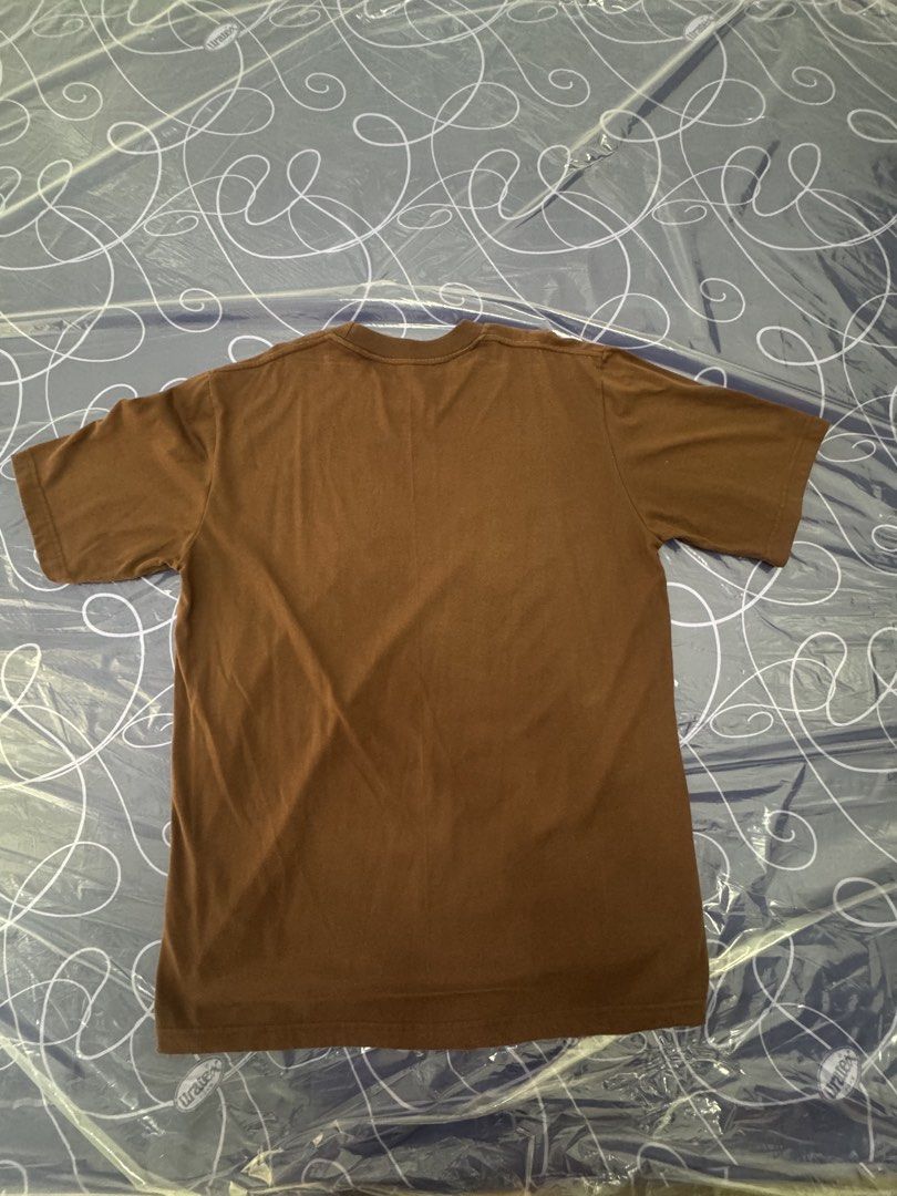 Plain Dark Brown T-Shirt 2XL (Pre-loved) (Category: Tshirts & Polo Shirts ) located in Santo Tomas. Submitted by toughu (Listing ID 1470148791, Image 3). Description: - Color: Solid Dark Brown - Size: 2XL (Relaxed fit) - Neckline: Crew neck with ribbed band - Design: Plain front and back (no graphics) - Material: Soft and comfortable for daily wear - Versatile: Easy to match with any outfit.