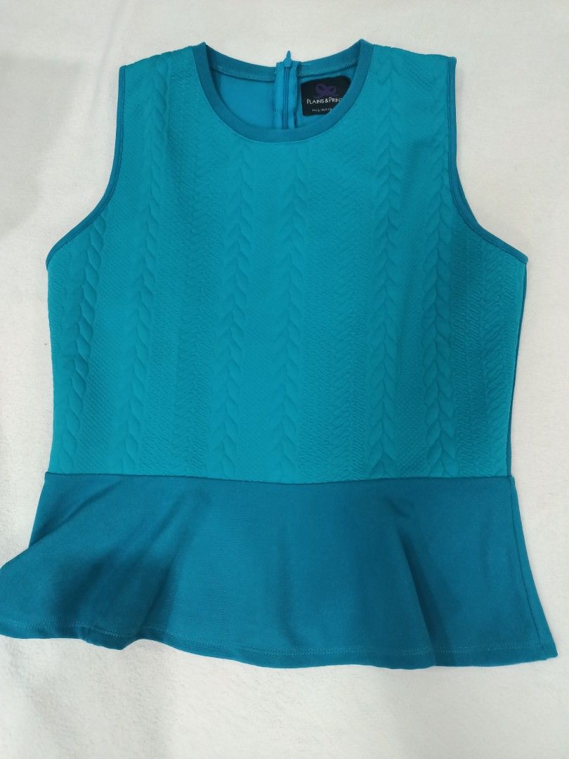 Plains & Prints Teal Peplum Top Size L (Category: Sleeveless) located in Manila. Submitted by jollynest24 (Listing ID 1470279852, Image 1). Description: - Brand: Plains & Prints - Color: Teal - Size: PHL L / EUR 12 / USA 8 - Design: Sleeveless with a textured front panel and peplum hem - Closure: Back zipper - Condition: Like new. Great for office wear and smart casual outfits - Location : Sampaloc Manila - Gcash ( MOP) .