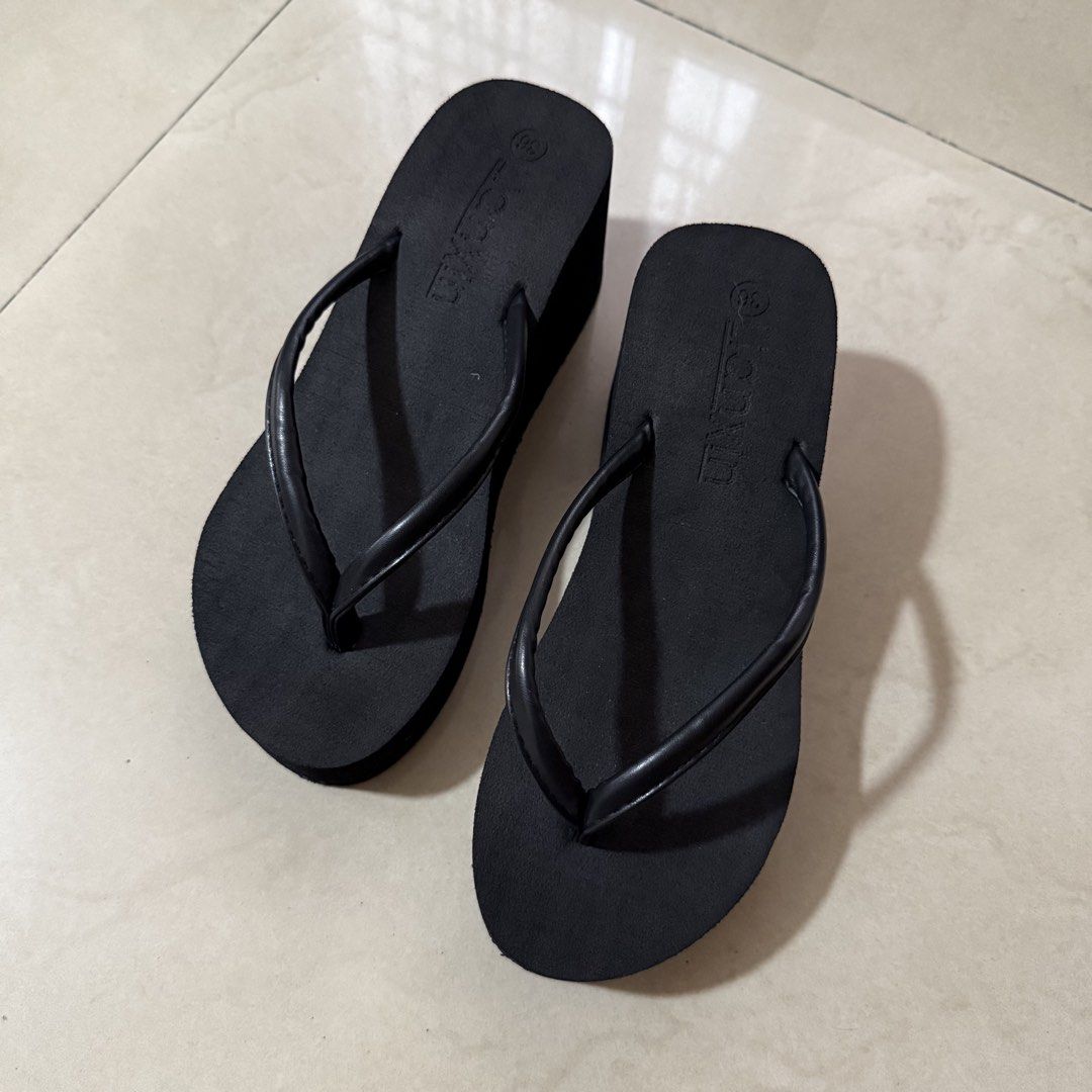 Platform Wedge Slippers 7cm (Category: Wedges) located in Quezon City. Submitted by 0ffTheRack (Listing ID 1470240130, Image 1). Description: - 22.5 cm - Clean footbed and sturdy soles - Good for wide feet - Rfs: straps are too loose on me (i have narrow feet).