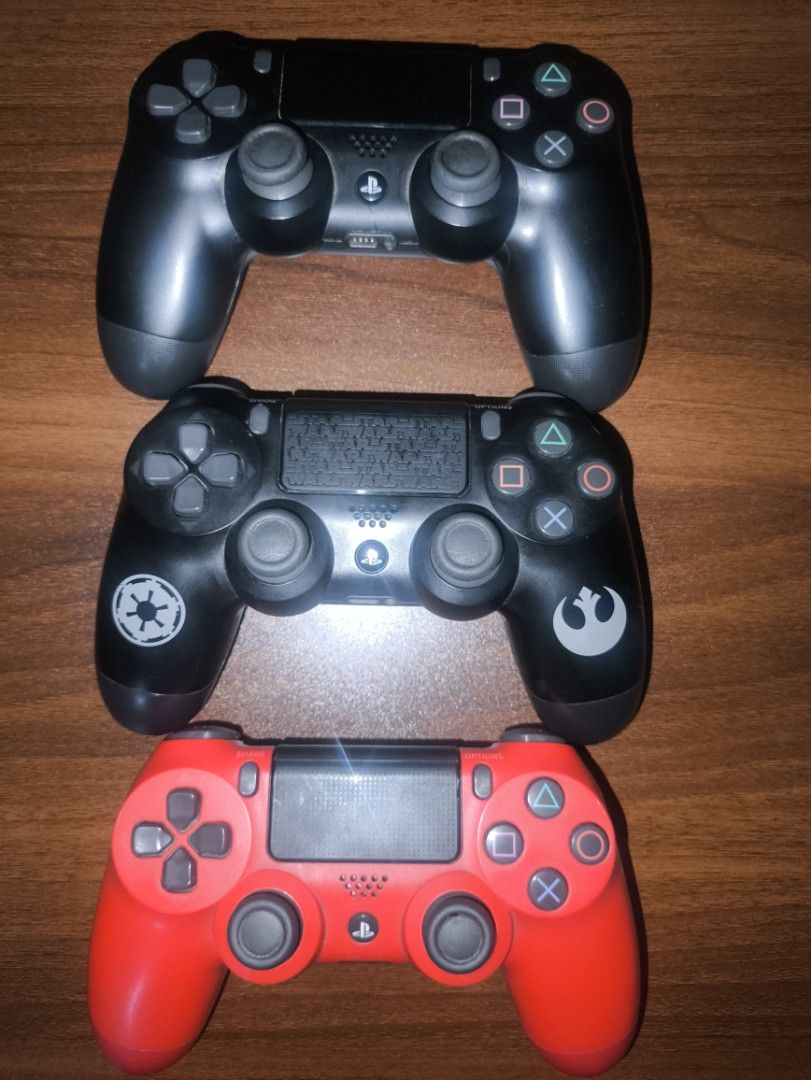 PlayStation 4 DualShock Wireless Controllers (Set of 3) (Category: Controllers) located in Pasig City. Submitted by lance_a (Listing ID 1470229318, Image 1). Description: For Sale Only Pass sa trade DS4 Controller Star Wars Battlefront, DS4 Magma Red, at DS4 Jet black. lahat sila original. Original sila walang drift o problema. Ung red lang wala vibration pero sa performance goods na goods ka. Condition nila? Used pero hindi mo gaano makikita gaa