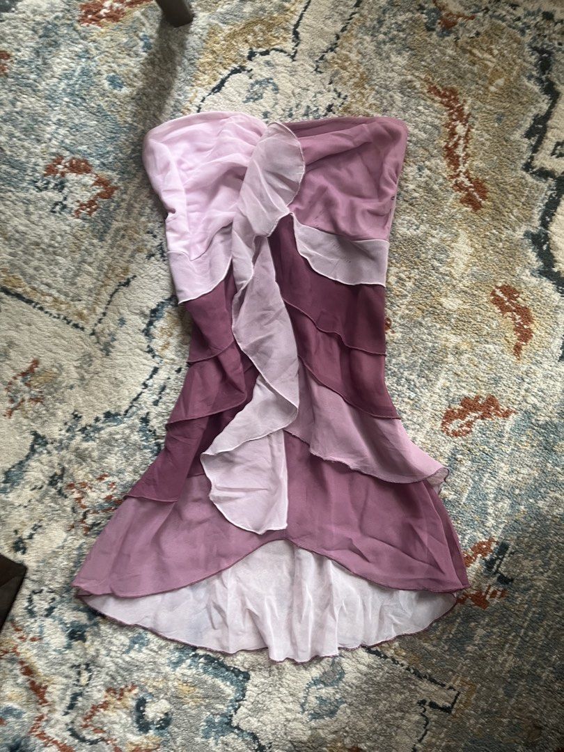Plum multi-tone strapless ruffled high-low dress (Category: Dresses) located in Pasay City. Submitted by robinesbin (Listing ID 1470203411, Image 1). Description: - Bought at a pop-up - Strapless long top - Gradient plum to pink color scheme with tiered front ruffles - Minor flaw (small marks barely noticeable) - Lightweight, airy chiffon-like fabric with a soft lining.