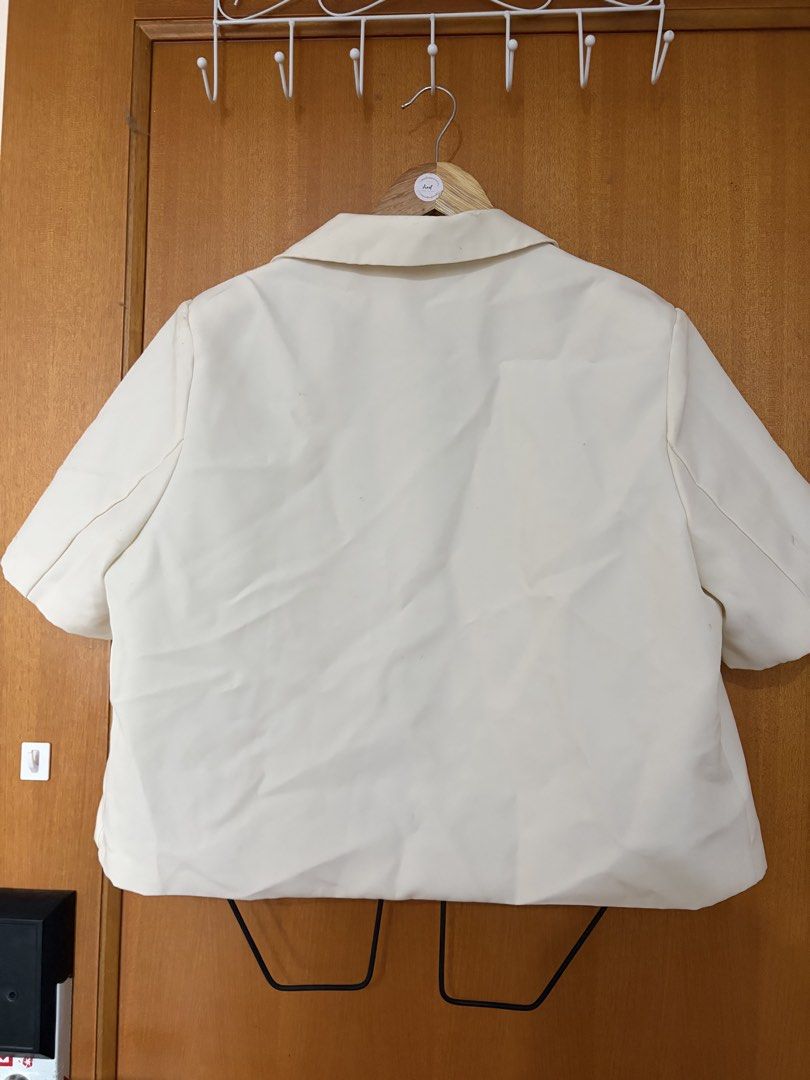 Plus size blazer/coat (Category: Coats, Jackets and Outerwear) located in Taguig. Submitted by jgbrl_03 (Listing ID 1470218934, Image 3). Description: - Brand/Model: Rasa Duffy cream short sleeve blazer - Design: Notch lapels, two front buttons, and two functional pockets - Lining: Chic white and grey vertical stripe inner lining - Best fit: Large to semi xl body frame -Worn once -Condition: Premium Quality.
