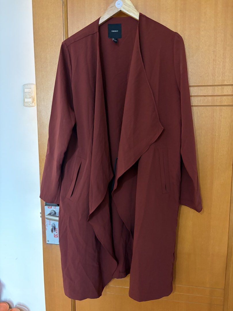 Plus Size Forever 21 Maroon Long Cardigan Size L (Category: Coats, Jackets and Outerwear) located in Taguig. Submitted by preloved_by_janel (Listing ID 1470272638, Image 1). Description: - Brand: Forever 21 - Color: Maroon - Size: L (true to size) best fit 0xl body frame - Style: Open front with drape lapel and two side pockets - Condition: Good as new .