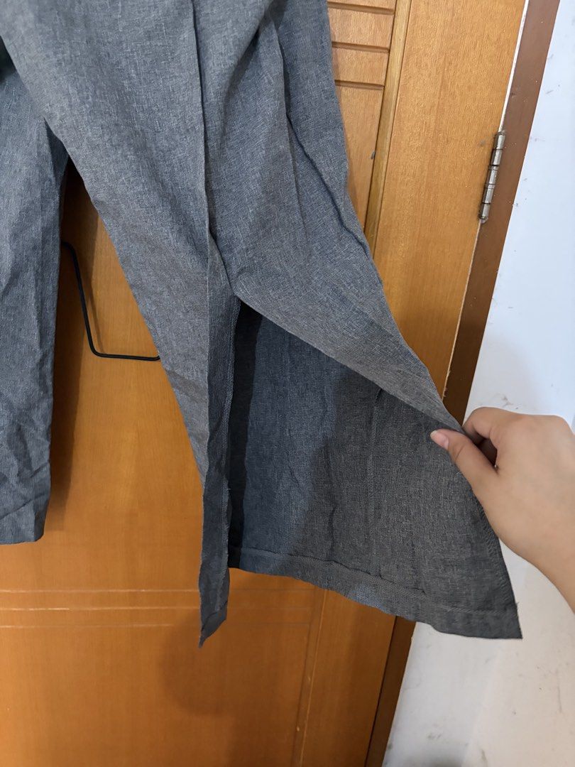 Plus size office pants (Category: Jeans) located in Taguig. Submitted by jgbrl_03 (Listing ID 1470218476, Image 2). Description: - Color: Grey - Fit: Relaxed, cropped length - Material: Textured, heathered fabric - Closure: Button closure with belt loops - Design: Unique side slit detail at the hem for easy movement -Best fit: 2xl body frame (38-30 waistline) - Used once.