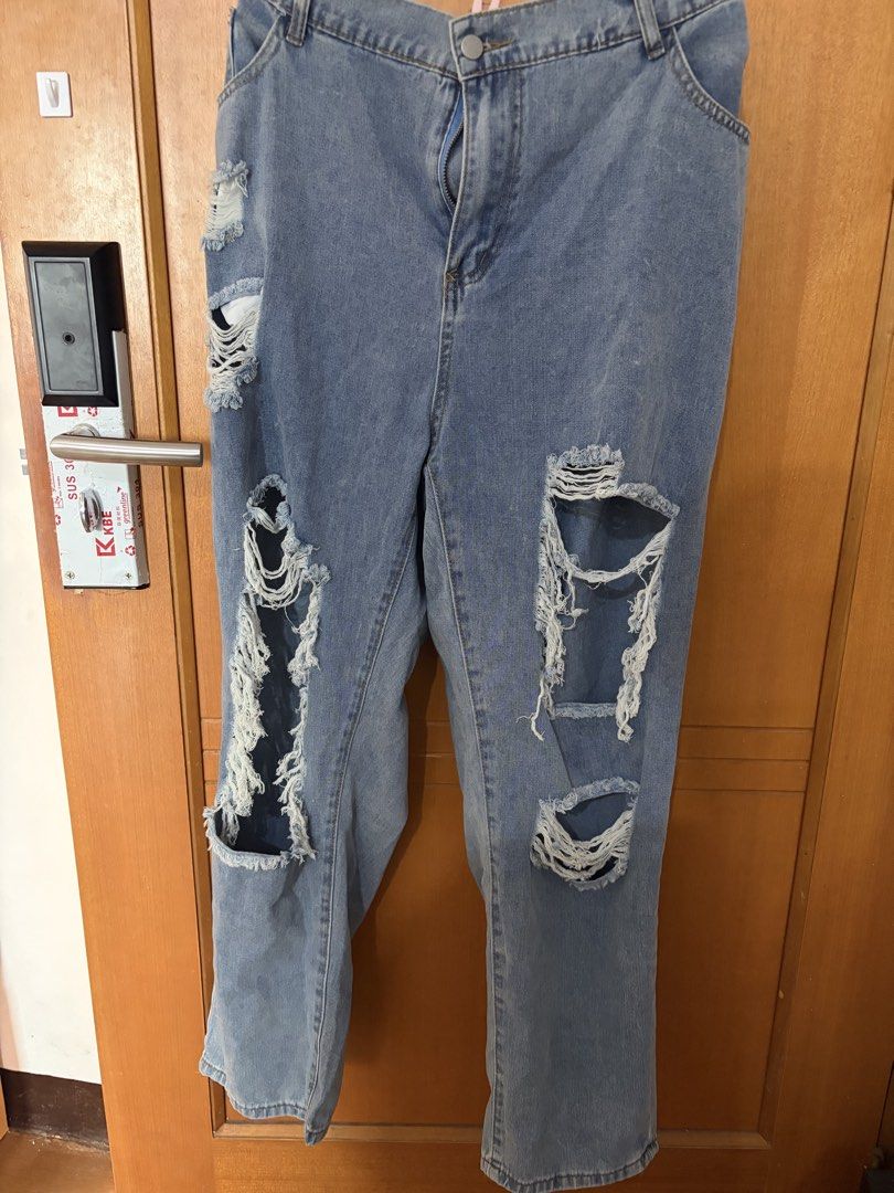 Plus size ripped mom jeans (Category: Jeans) located in Taguig. Submitted by jgbrl_03 (Listing ID 1470221004, Image 2). Description: - Style: Light wash denim jeans with a trendy high-waist cut - Fit: Relaxed through the thighs with straight cuffs - Details: Heavy distressing, rips, and shredded details on the front panels - Closure: Classic button and zipper closure - Best fit: 36-38 waistline (stretchable waist up to 40 inches pero not flatteri