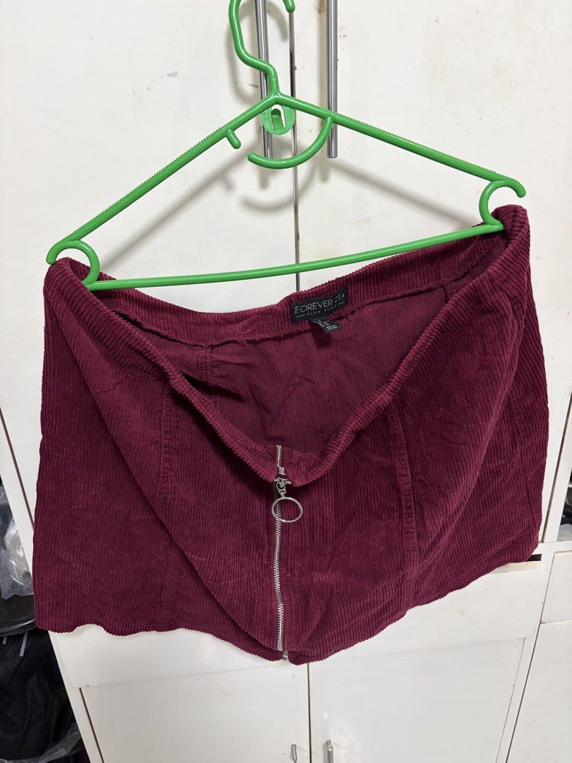 Plus size skirt bundle (Forever21+ and Shein) (Category: Skirts) located in Pateros City. Submitted by selleysells (Listing ID 1470245639, Image 2). Description: - Brand: Forever 21 Plus - Size: 3X - Color: Deep burgundy - Material: Structured ribbed corduroy fabric - Closure: Front silver-tone zip with round ring pull - Condition: Clean, neat stitching, and ready to wear SHEIN - 4XL 1. Denim Skort 2. Denim Skirt PRICE NEGO.