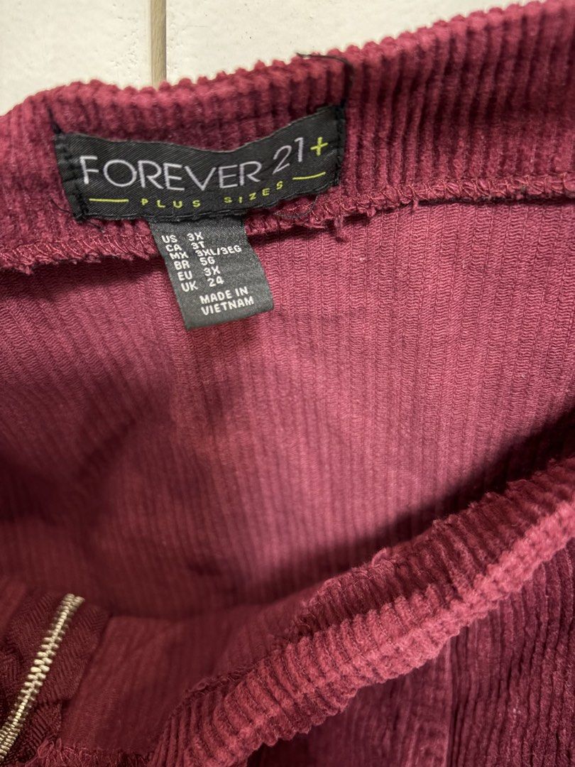 Plus size skirt bundle (Forever21+ and Shein) (Category: Skirts) located in Pateros City. Submitted by selleysells (Listing ID 1470245639, Image 3). Description: - Brand: Forever 21 Plus - Size: 3X - Color: Deep burgundy - Material: Structured ribbed corduroy fabric - Closure: Front silver-tone zip with round ring pull - Condition: Clean, neat stitching, and ready to wear SHEIN - 4XL 1. Denim Skort 2. Denim Skirt PRICE NEGO.