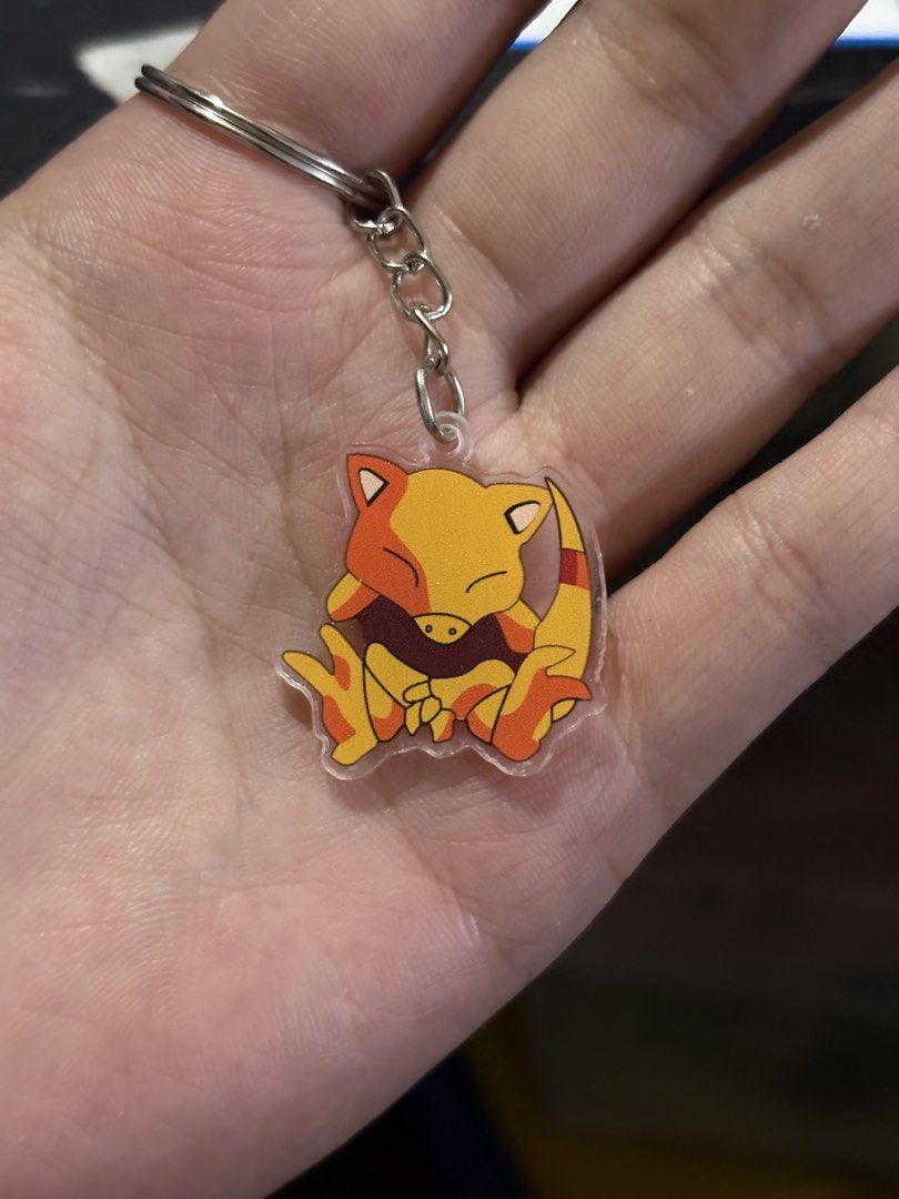 Pokemon Acrylic Keychains Anime Charms (Category: Character Goods) located in Manila. Submitted by royalpengwen (Listing ID 1470306829, Image 3). Description: - Pokémon double-sided acrylic keychains (Oshawott, Drowzee, Clefable, Starmie and more ) - Made of clear, durable acrylic with vibrant character prints - Comes with a sturdy metal split ring and chain - Ideal for keys, backpacks, and lanyards - Multiple designs available to choose from Req