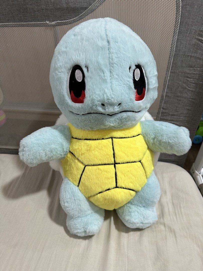 Pokemon Squirtle plush stuffed toy (Category: Plushies & Soft Toys) located in Manila. Submitted by aj.honey (Listing ID 1470196079, Image 1). Description: - Authentic Pokémon Squirtle plush toy - Soft light blue fur, yellow belly, and detailed brown shell - Embroidered eyes and facial features for safety and durability - Features a cute, big curled tail - Clean fabric with fluffy stuffing inside - Perfect addition to any Pokémon collection or as