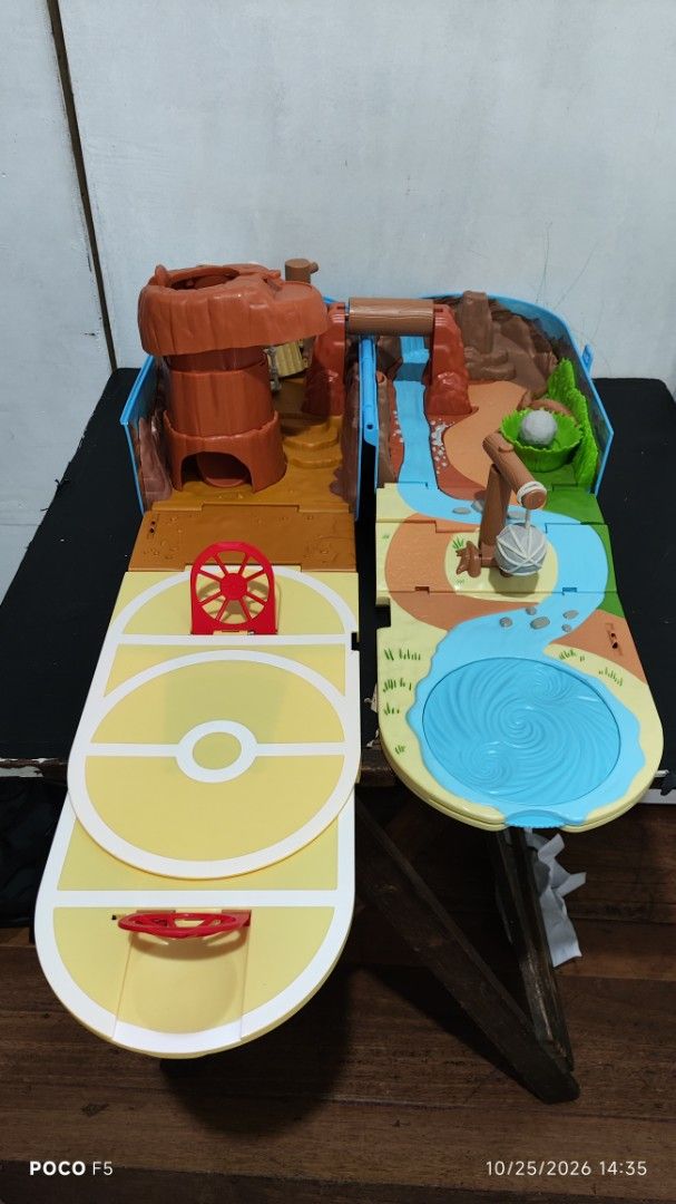 Pokemon Training Backpack Playland (Category: Action & Battle Toys) located in Quezon City. Submitted by ralphralph (Listing ID 1470247149, Image 2). Description: - Official Pokémon portable backpack and battle arena in one - Transforms from a compact blue Poké Ball backpack into a full training landscape - Features rocky mountain paths, river rapids, battle fields, and trap zones - Great fun for young Pokémon fans and collectors - Clean conditio