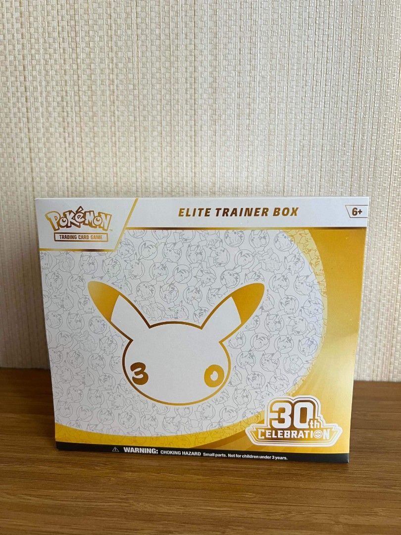 Pokémon Celebrations Elite Trainer Box (ETB) English (Category: Card Boxes & Cases) located in Rizal. Submitted by espinosajoshuadaniel (Listing ID 1470164029, Image 1). Description: - Custom/fan-made 30th Anniversary Pikachu Elite Trainer Box (Note: Not an official Pokémon product) - Elegant gold and white design, ideal for collectors and display - Brand new, factory sealed, and in pristine condition - A unique addition to any Pokémon collection