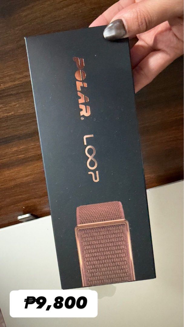 Polar Loop (Category: Wearables & Smart Watches) located in Quezon City. Submitted by mhzlgsc (Listing ID 1470150918, Image 1). Description: - Model: Polar Loop fitness tracker - Color: copper with woven fabric strap and metallic buckle - Condition: Brand new and unopened packaging - Packaging: Original black box with copper lettering - What you see is what you get (exactly as pictured).
