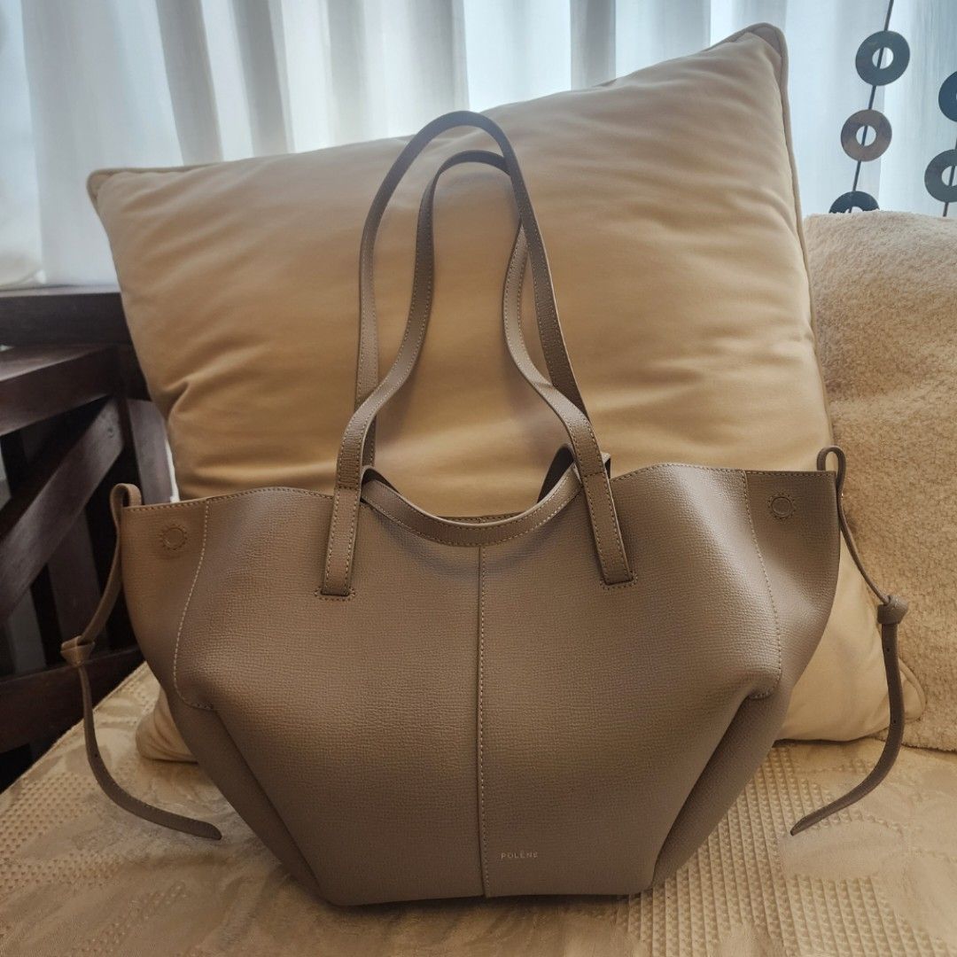 Polène Cyme mini, taupe (Category: Tote Bags) located in Mandaluyong City. Submitted by nnnightsss (Listing ID 1470177903, Image 1). Description: - Brand: Polène Cyme mini - Color: Textured grey-taupe - Material: Premium leather with tonal stitching - Straps: Dual shoulder straps and thin side straps with knot details - Origin: Made in Spain - Condition: Excellent with dustbag Php20K plus lsf rfs: haven't used it much.