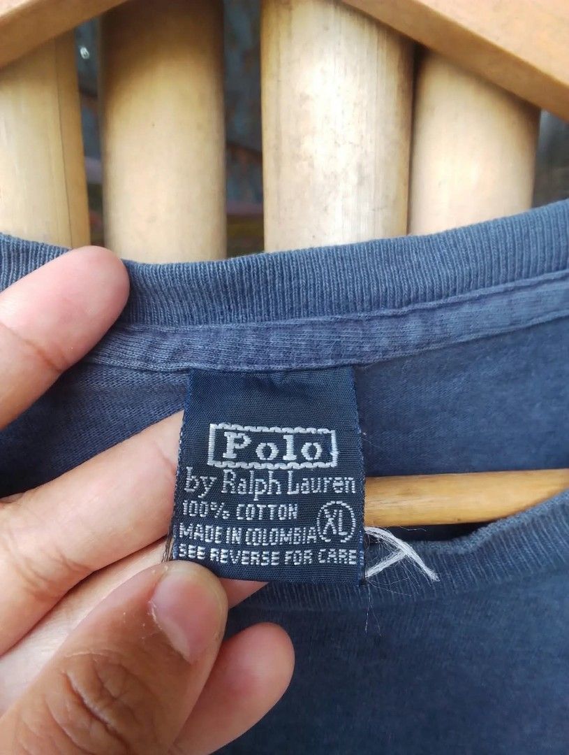 Polo by RALPH LAUREN (Category: Tshirts & Polo Shirts ) located in Palayan City. Submitted by angelicapelagiobuates-blueapp (Listing ID 1470348920, Image 2). Description: Polo Ralph Lauren Vintage Tee- Navy Blue Size XL details: Authentic Polo by RALPH LAUREN 100% cotton size xl made in colombia color faded navy/vintage wash PRINT: Mark of tested quality tested since 1967/ fish graphic condition 9/10 DIMES: 21/28.5 no major issues.