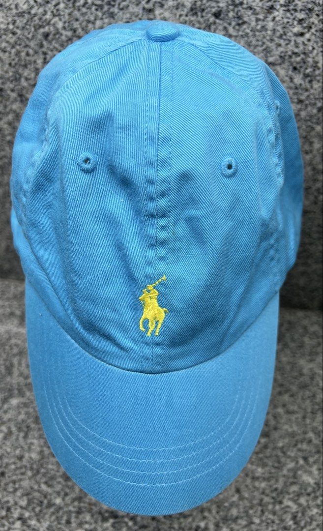 Polo Ralph Lauren Light Blue Baseball Cap (Category: Caps & Hats) located in Pasig City. Submitted by edgarlou (Listing ID 1470171016, Image 1). Description: - Brand: Polo Ralph Lauren - Condition: Brand new with tags (BNWT) - Color: Light blue with yellow embroidery - Material: 100% cotton - Design: Yellow embroidered pony logo on front, yellow text above the back strap - Closure: Adjustable metal slider buckle.