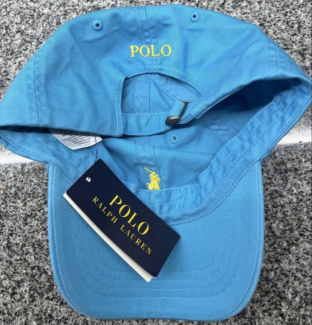 Polo Ralph Lauren Light Blue Baseball Cap (Category: Caps & Hats) located in Pasig City. Submitted by edgarlou (Listing ID 1470171016, Image 2). Description: - Brand: Polo Ralph Lauren - Condition: Brand new with tags (BNWT) - Color: Light blue with yellow embroidery - Material: 100% cotton - Design: Yellow embroidered pony logo on front, yellow text above the back strap - Closure: Adjustable metal slider buckle.