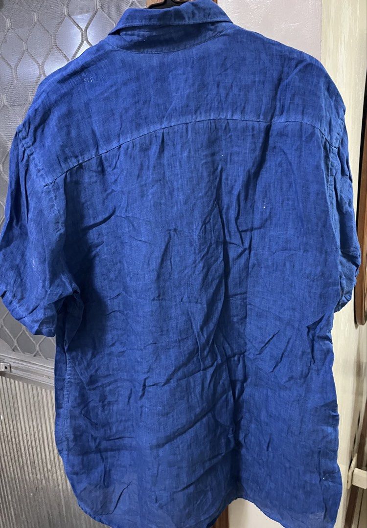 Polo unisex (Category: Others Tops) located in Bacoor. Submitted by ayit. (Listing ID 1470272295, Image 2). Description: Orig japan sf inc med-large fit - Type: Unisex Polo Shirt - Color: Royal Blue - Brand: Japan Brand - Size: Medium (M) - Features: Classic button-down collar, front button closure, and one chest pocket - Material: Lightweight and breathable fabric, great for warm weather - Condition: Layered condition 3, well-maintained - Meetup