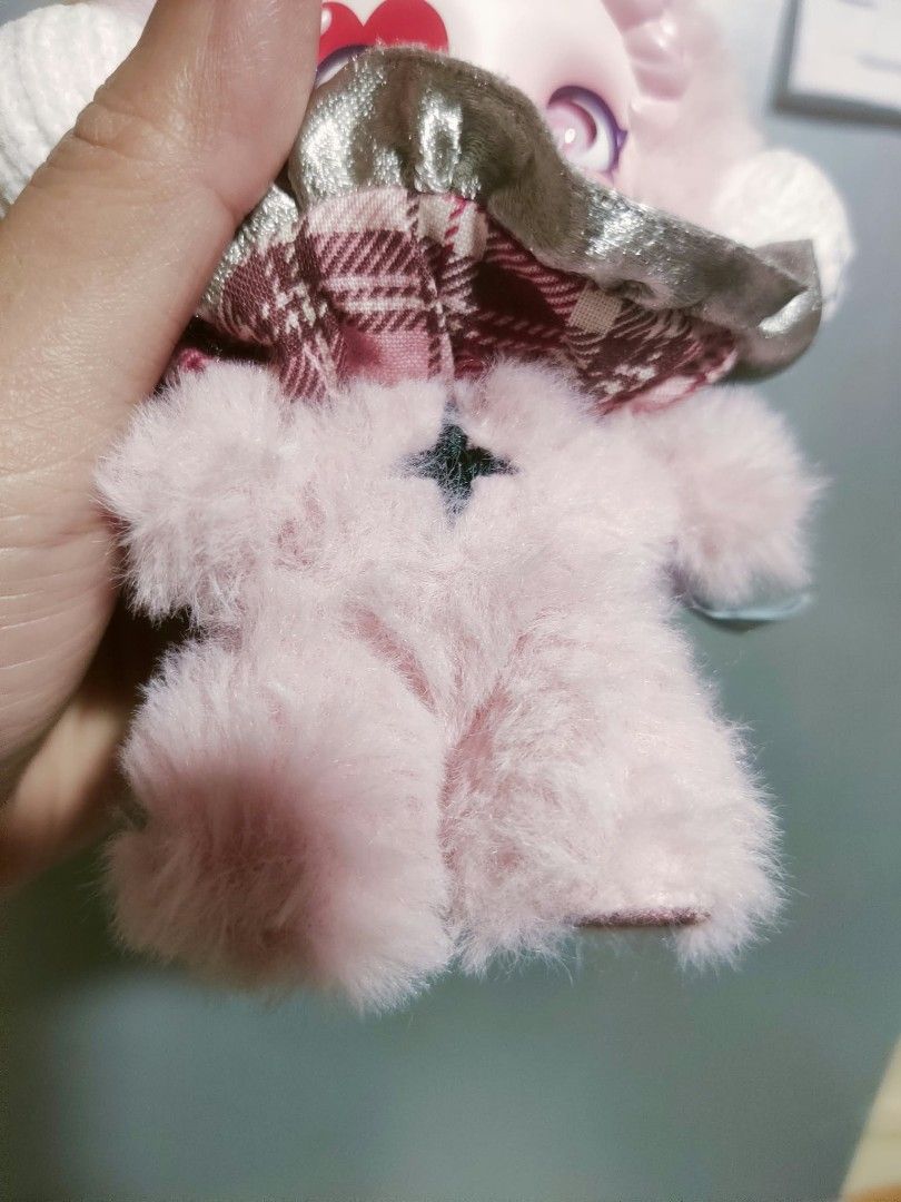 Pop Mart Skullpanda Plush Keychain Pink (Category: Plushies & Soft Toys) located in Manila. Submitted by jhs31 (Listing ID 1470308608, Image 2). Description: - 100% Authentic Pop Mart Skullpanda plush keychain - Soft pink fluffy body with sculpted pink hair - Detailed face makeup featuring a red heart and purple accents - Adorned with a plaid collar and silver ruffled trim - Includes a branded blue ribbon and round metal keyring - Comes with orig