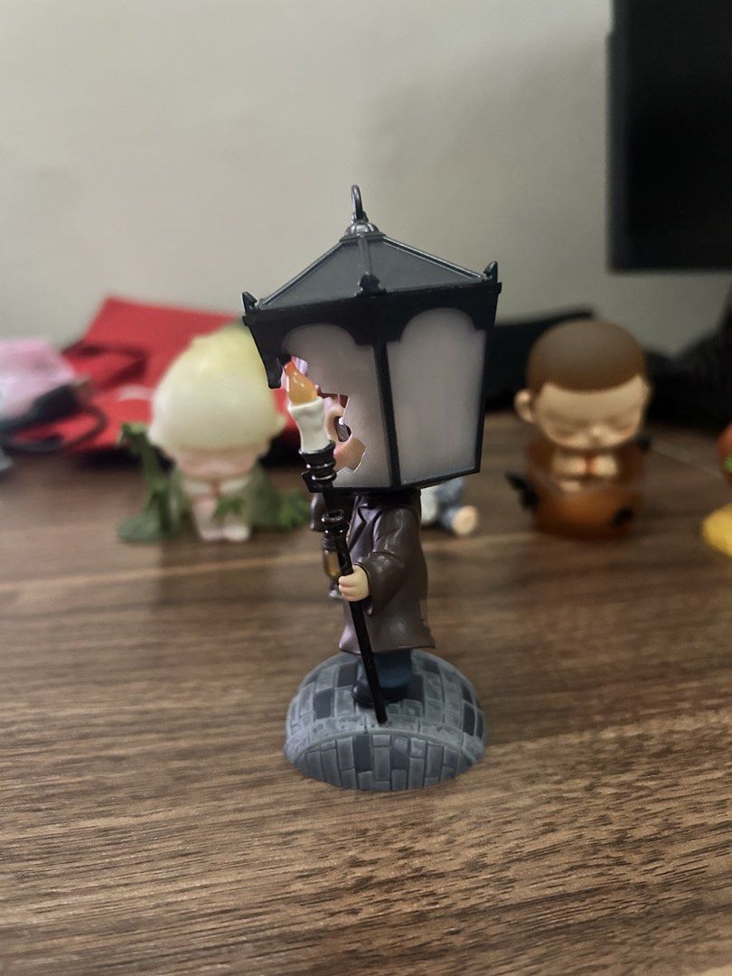POPMART HIRONO X LE PETIT PRINCE (Category: Designer & Blind Box Toys) located in Manila. Submitted by mihos.garage.sale (Listing ID 1470187079, Image 2). Description: - Brand: Pop Mart hirono Collectible Figure - Design: Wearing a brown coat and street lamp hat - Accessories: Holding a candlestick and tiny lantern - Base: Includes a detailed cobblestone base - Condition: Brand new / Mint in box (Great for display on desks or shelves).