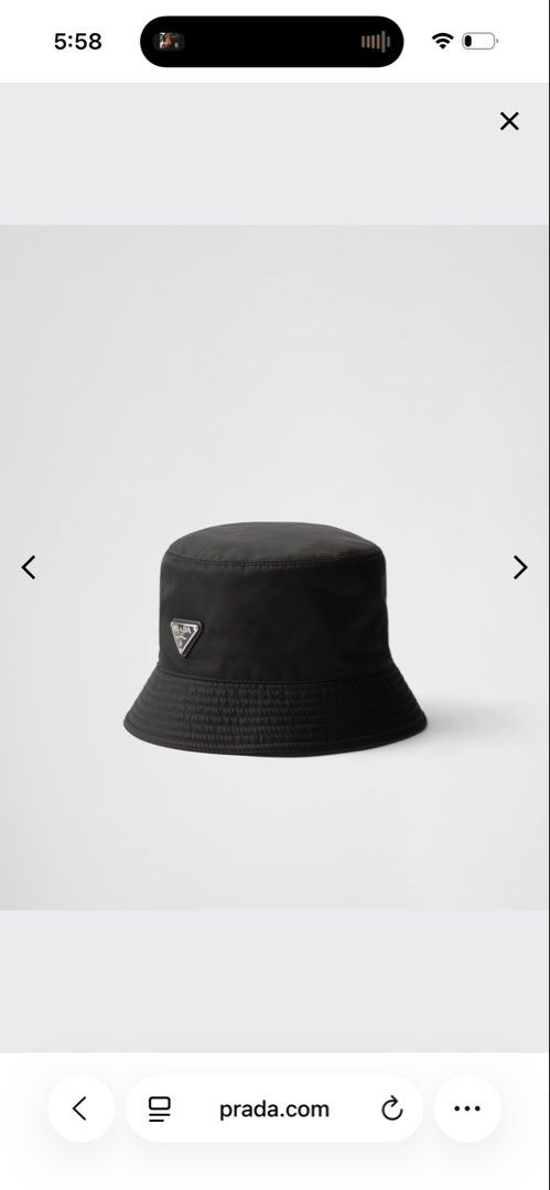 PRADA Re-Nylon bucket hat (Category: Luxury Accessories) located in Taguig. Submitted by gdgdgdgd__23 (Listing ID 1470251561, Image 1). Description: Slightly used Size M Authenticatable via NFC Bought in Korea With dust bag Negotiable .