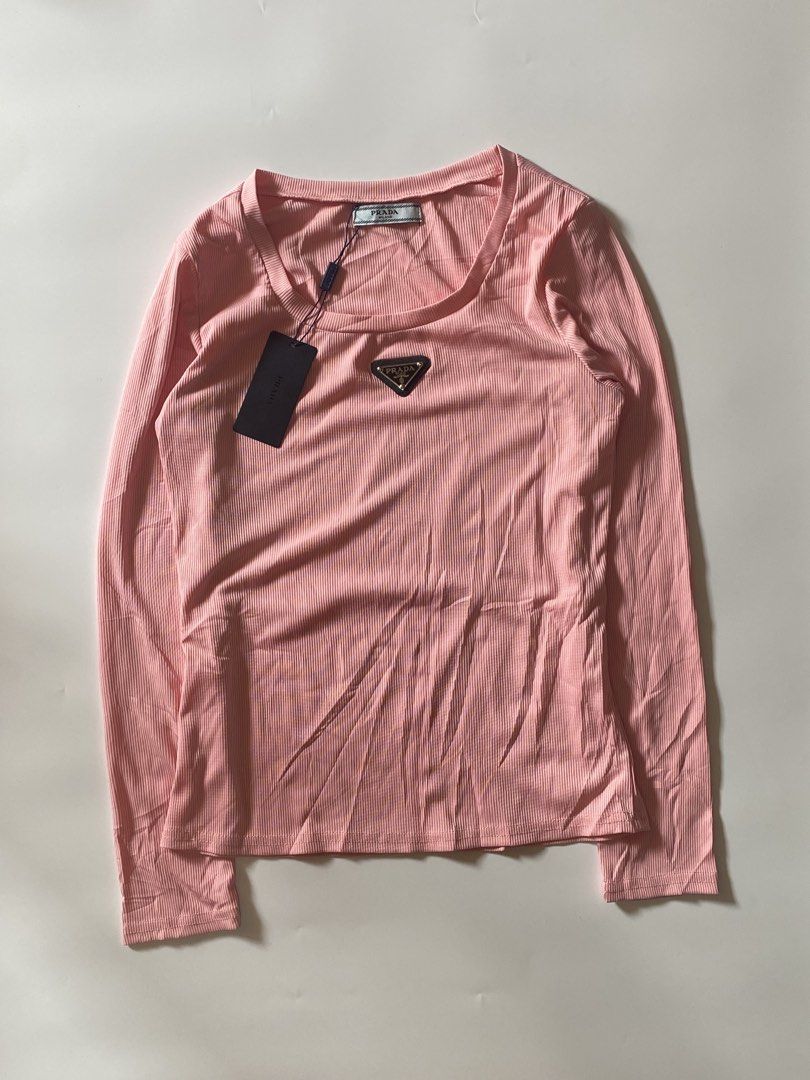 Prada Ribbed Longsleeve Top (Category: Longsleeves) located in Makati City. Submitted by la_femme_by_bncks (Listing ID 1470259941, Image 2). Description: Length 24 Width 15 *each* Measured it by inches Issue: N/A This is a pre-loved/thrifted items and may show minor signs of issue due to its vintage nature. Kindly manage expectations. No refunds or exchanges will be accepted. 📍Pasay City DM for inquiries..
