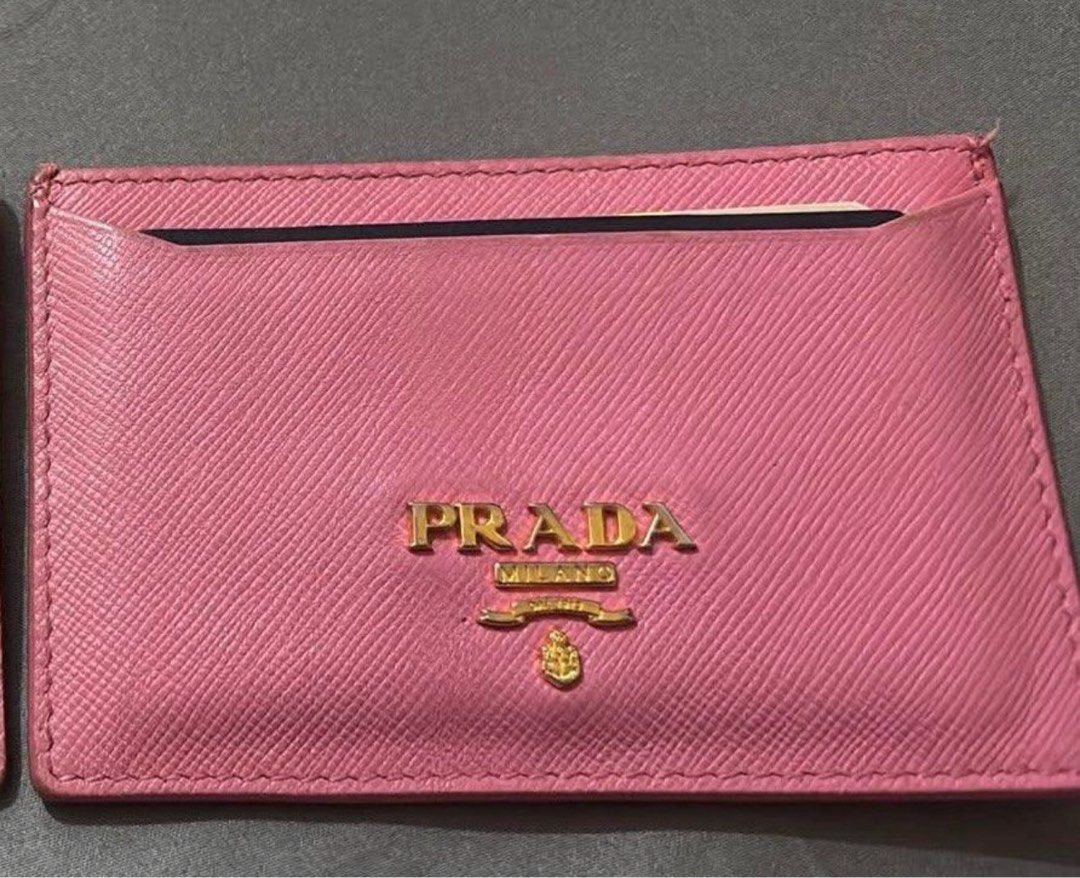 Prada Saffiano Leather Pink Card Holder (Category: Luxury Bags & Wallets) located in Manila. Submitted by ggdolls (Listing ID 1470335731, Image 1). Description: - Authentic pink Prada card holder l - Gold hardware - Clean interior - Compact and lightweight, perfect for mini bags and pockets - Got this from sonu vintage.