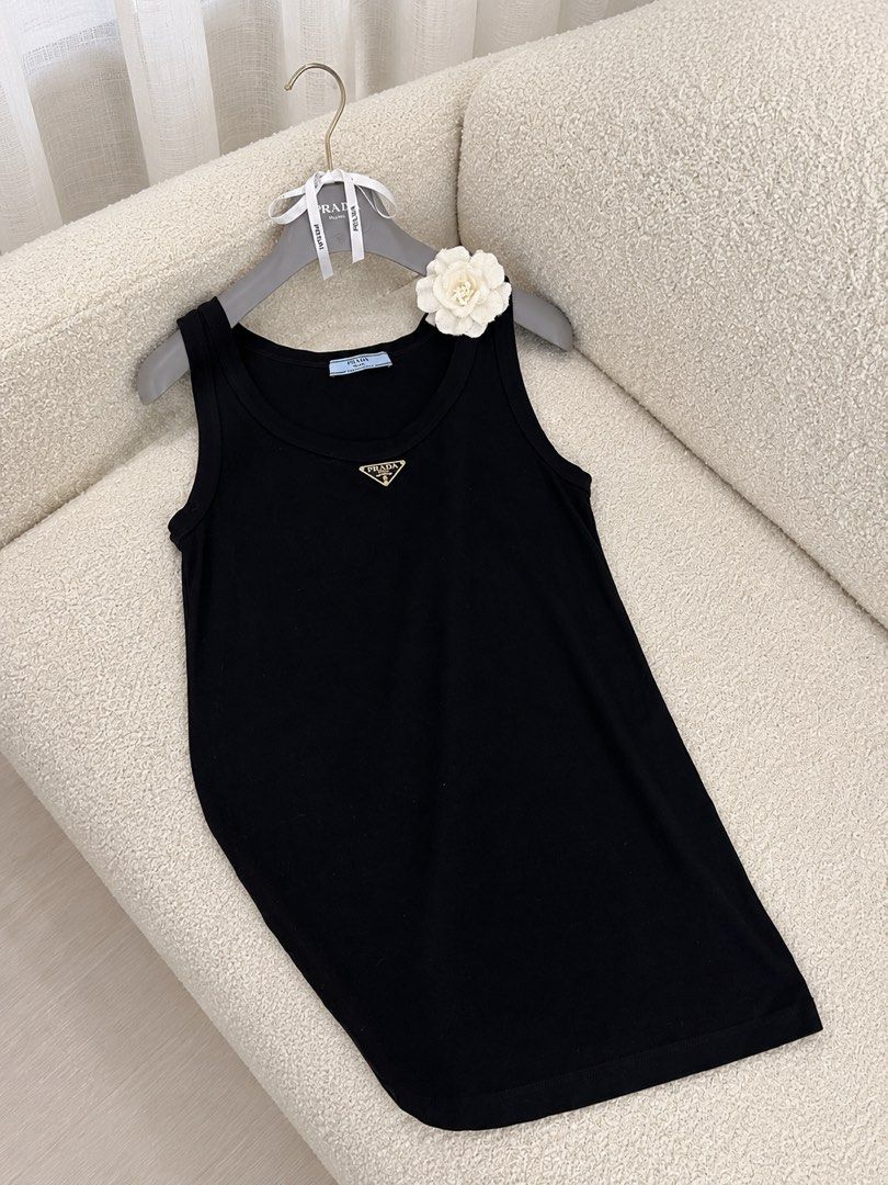 ⚜️Prada sleeveless top (Category: Luxury Apparel) located in Makati City. Submitted by 90sangel (Listing ID 1470272039, Image 2). Description: •Item: Prada top, rare & hard to find •Size: M-L frame •Condition: Gently Used, Good condition.