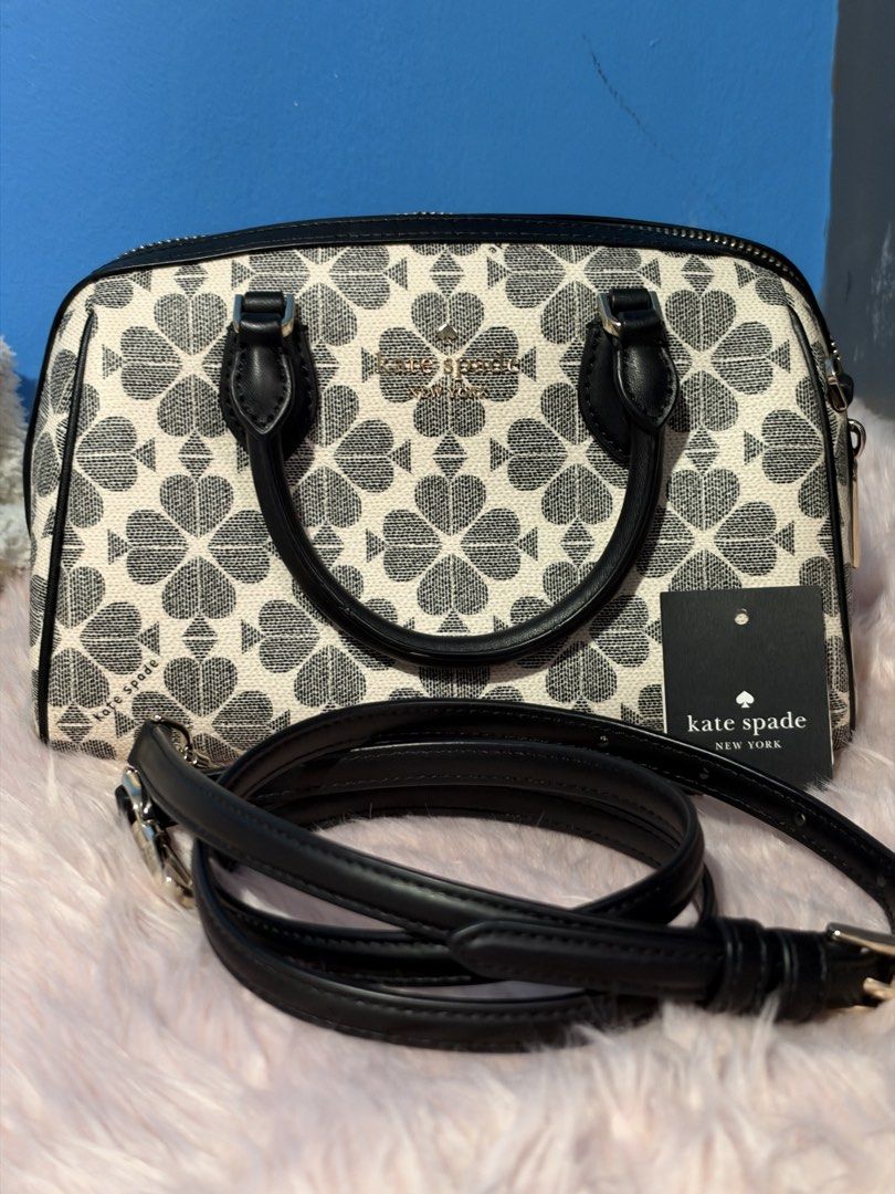 Preloved Kate Spade Flower pv (Category: Shoulder Bags) located in Makati City. Submitted by jhennlt (Listing ID 1470223027, Image 1). Description: US bought Authentic Size: Approx. Height 14.5 x Width 23 x Depth 11cm, Handle length approx. 26cm, Shoulder strap length approx. 131.5cm (removable) (adjustable length) Weight: Approx. 395g Material: PVC Specifications: Main closure: Zipper, 1 inner pocket RFS: decluttering.