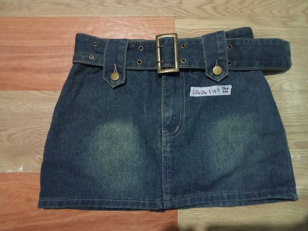Premium Denim Kendal SKORT (Category: Skirts) located in Manila. Submitted by athena_thrift_shop (Listing ID 1470172654, Image 1). Description: - Collection of trendy denim skirts and shorts - Comes with attached belts and stylish metal buckles - Available washes: Classic blue wash and solid black - Sizes available (based on labels): S-28, S-30, and S-32 - Durable denim fabric featuring secure button details - Multiple styles available—please sen