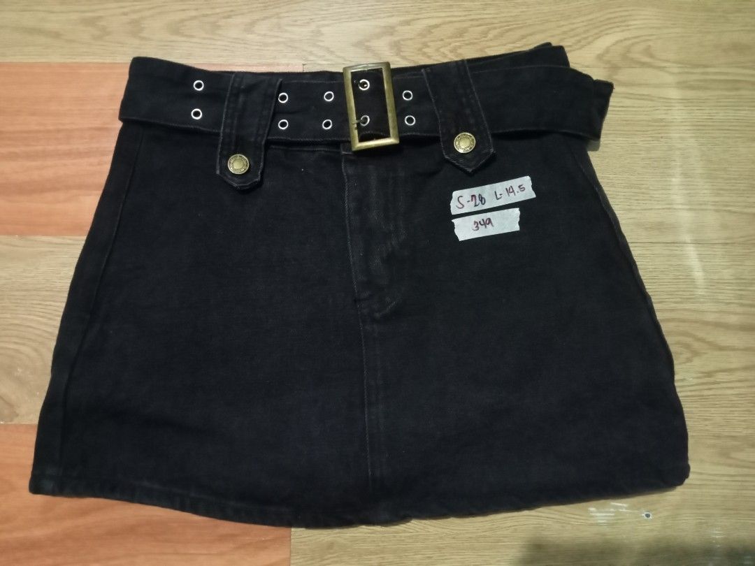 Premium Denim Kendal SKORT (Category: Skirts) located in Manila. Submitted by athena_thrift_shop (Listing ID 1470172654, Image 3). Description: - Collection of trendy denim skirts and shorts - Comes with attached belts and stylish metal buckles - Available washes: Classic blue wash and solid black - Sizes available (based on labels): S-28, S-30, and S-32 - Durable denim fabric featuring secure button details - Multiple styles available—please sen