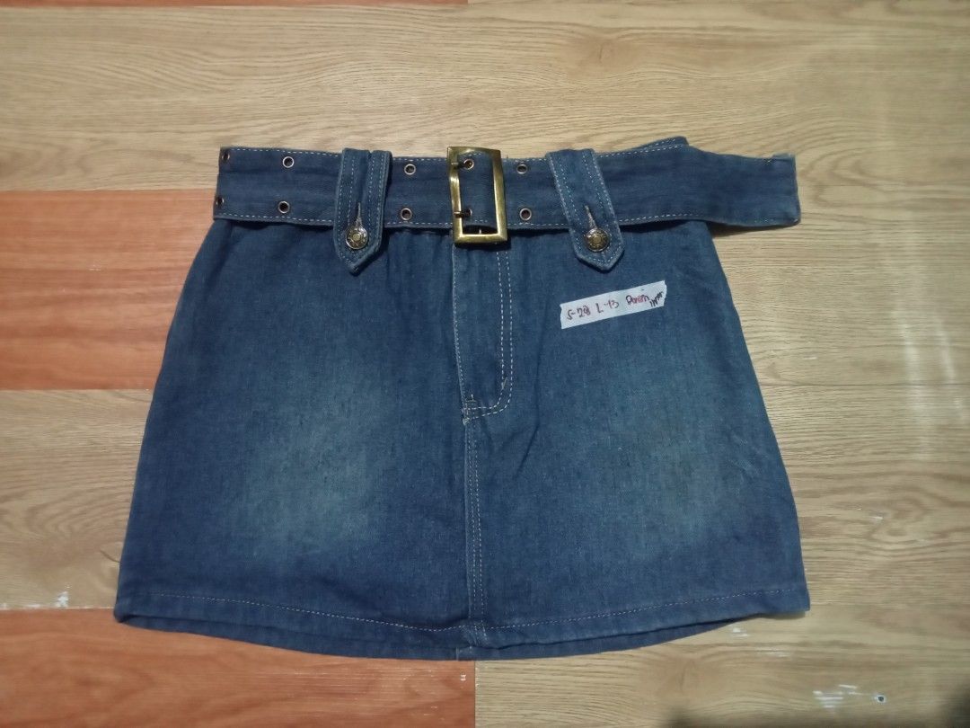 Premium Denim Kendal SKORT (Category: Skirts) located in Manila. Submitted by athena_thrift_shop (Listing ID 1470172654, Image 2). Description: - Collection of trendy denim skirts and shorts - Comes with attached belts and stylish metal buckles - Available washes: Classic blue wash and solid black - Sizes available (based on labels): S-28, S-30, and S-32 - Durable denim fabric featuring secure button details - Multiple styles available—please sen