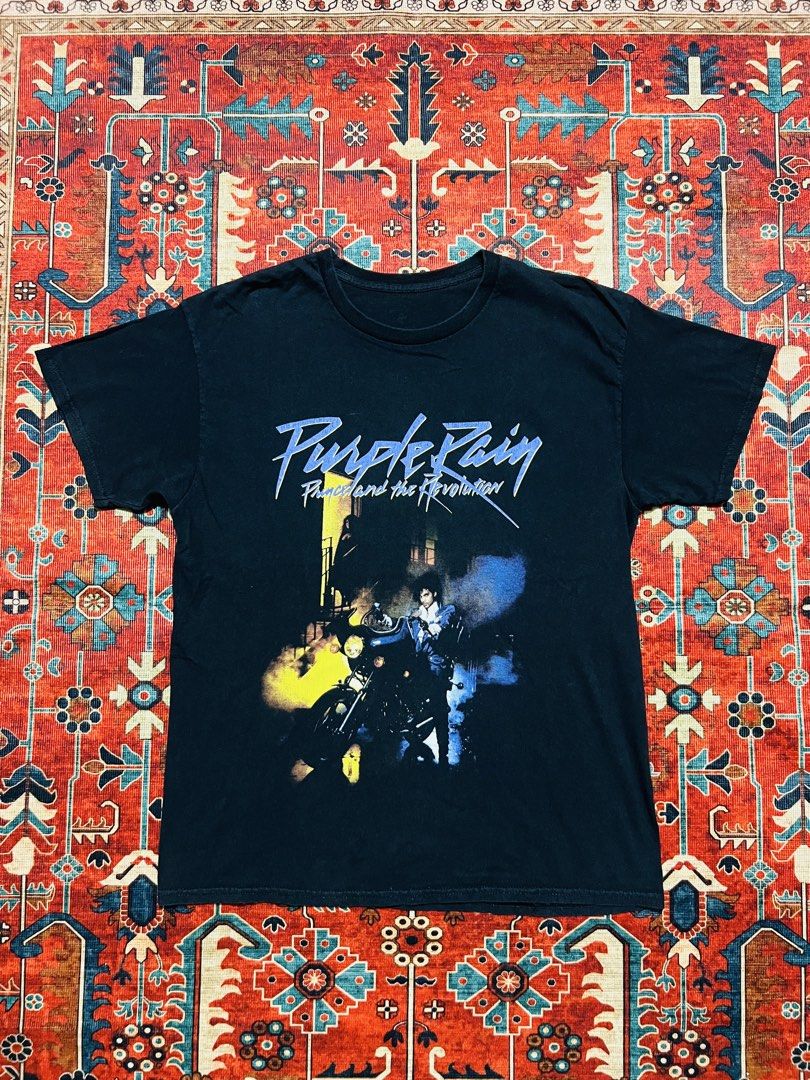 Prince & the revolution “Purple Rain” Black Tee (Category: Tshirts & Polo Shirts ) located in Imus. Submitted by the1994thriftshop.ph (Listing ID 1470151153, Image 1). Description: Prince & the revolution “Purple Rain” Black Tee Size: Large Pit to pit: 21.5 inches Top to bottom: 28.5 inches Price: Php 1,000.