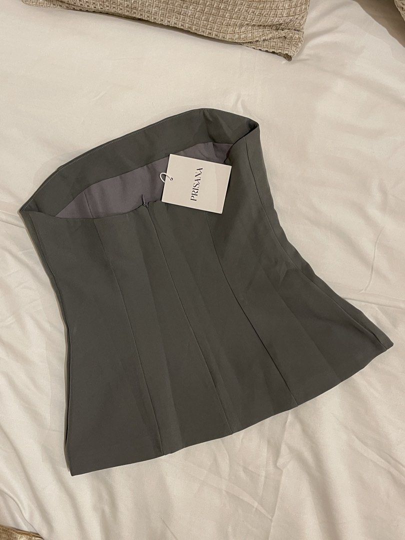 Prisana Tube Top (Category: Sleeveless) located in Quezon City. Submitted by everythingmustgo__ (Listing ID 1470253399, Image 2). Description: Brand new with tags (from BKK) Size: small Color: dark gray Seller’s actual size is extra small-small (when worn for reference only) ‼️ firm with price. low ballers will not be entertained ‼️.