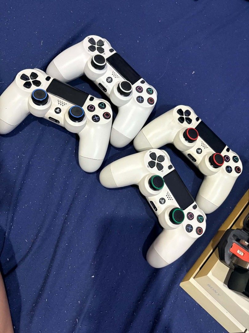PS4 Console Bundle with 4 Controllers Camera and Games (Category: PlayStation) located in Quezon City. Submitted by xelramos22 (Listing ID 1470298700, Image 2). Description: - PS4 console bundle in great working condition - Includes 4 white controllers - Comes with PlayStation camera and power cable - Includes 6 popular games: Race With Ryan, Lords of the Fallen, Battle, Fallout 4, Just Dance 2015, and Tekken 7 - Everything powers up normally - P