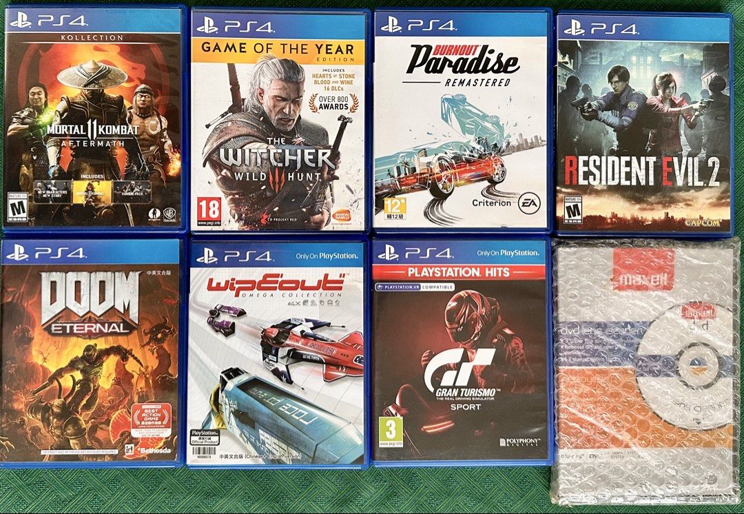 PS4 Games (Witcher 3, RE2, DOOM, etc.) – Bundle or Individual (Category: PlayStation) located in Quezon City. Submitted by simplysortedph (Listing ID 1470229144, Image 1). Description: Description: Selling my pre-loved PS4 games. All discs and cases are in great condition. Individual Prices: - The Witcher 3: Wild Hunt (GOTY Edition) - ₱850 - Mortal Kombat 11 Aftermath Kollection - ₱850 - WipEout Omega Collection - ₱850 - DOOM Eternal - ₱800 - Res