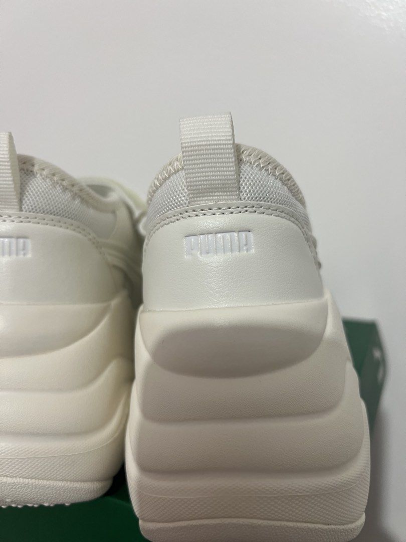 Puma White Chunky Platform Sneakers (Category: Sneakers) located in Malolos. Submitted by valenciafrances1108 (Listing ID 1470195387, Image 3). Description: - Brand new, never worn, fresh out of the box - All-white design with trendy chunky sculpted soles - Premium mesh and leather upper with a secure hook-and-loop top strap - Convenient pull tab at the back heel for easy wear - Pristine condition: spotless white midsoles and zero tread wear - In