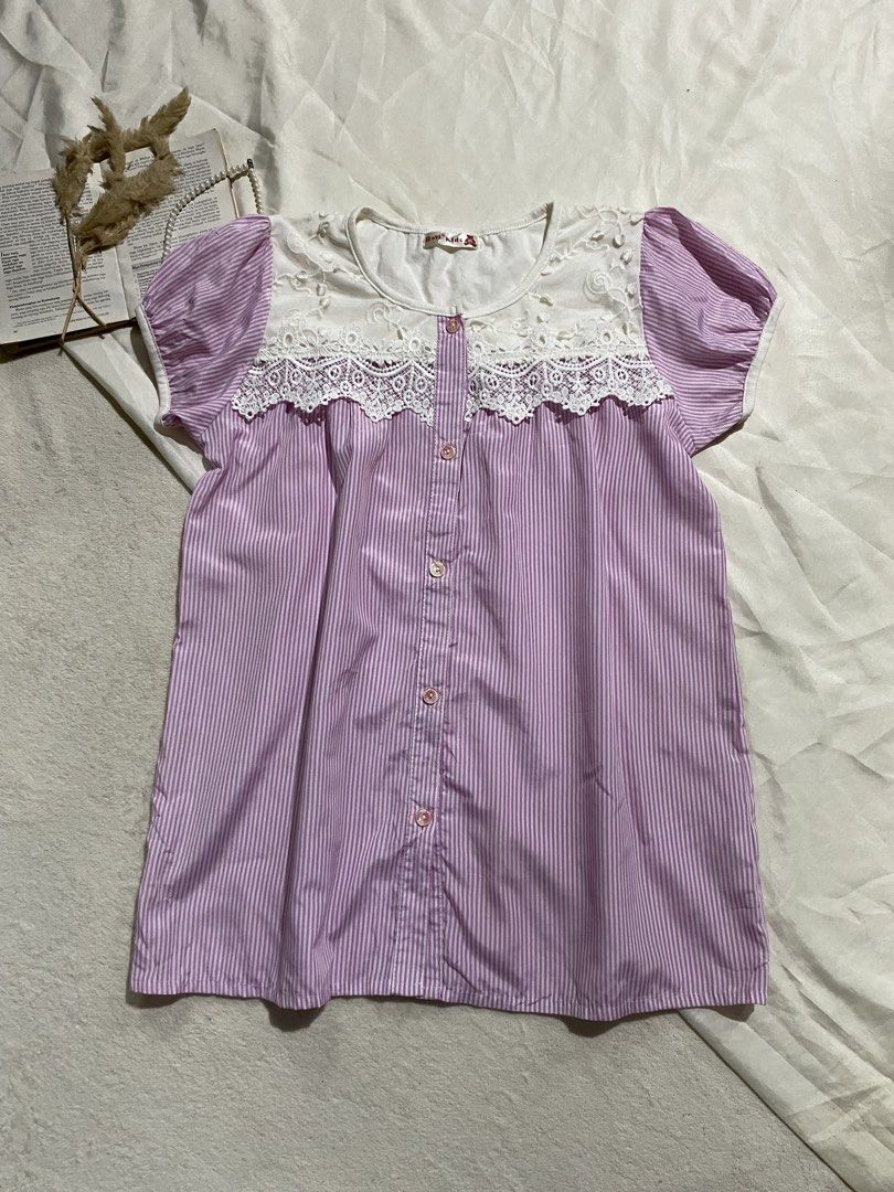 Purple striped button-down blouse with white lace yoke Small-Medium 37 (Category: Blouses) located in Poro. Submitted by joyceyuu (Listing ID 1470184552, Image 1). Description: - Style: Cottagecore / Casual Daily Wear - Design: Purple & white stripes with white embroidered lace yoke - Sleeves: Short puff sleeves with elastic cuffs - Details: Button-down front closure with cute .