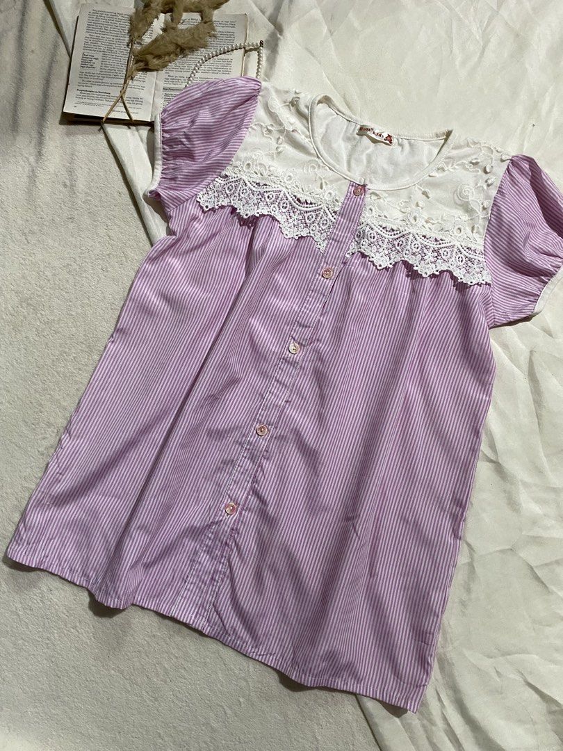 Purple striped button-down blouse with white lace yoke Small-Medium 37 (Category: Blouses) located in Poro. Submitted by joyceyuu (Listing ID 1470184552, Image 2). Description: - Style: Cottagecore / Casual Daily Wear - Design: Purple & white stripes with white embroidered lace yoke - Sleeves: Short puff sleeves with elastic cuffs - Details: Button-down front closure with cute .